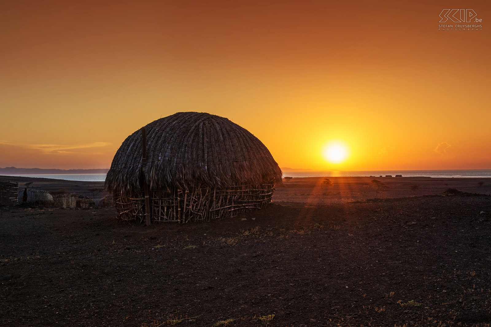 Lake Turkana - Sunset Wonderful sunset at Lake Turkana near a traditional hut of the Turkana people. Stefan Cruysberghs
